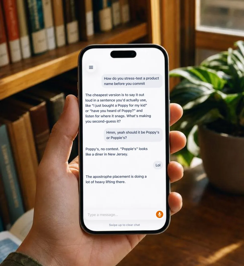 iPhone app in a hand.